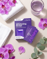 GlowTek Purple Whitening Strips - lifestyle flat lay